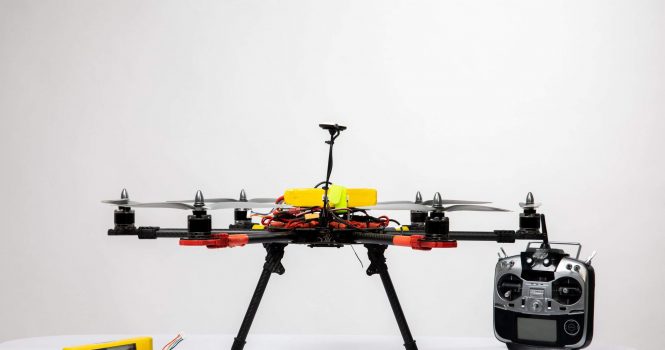 flying drone and silver joystick for it